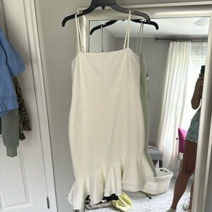 Likely size 6 asymmetrical ruffle white dress